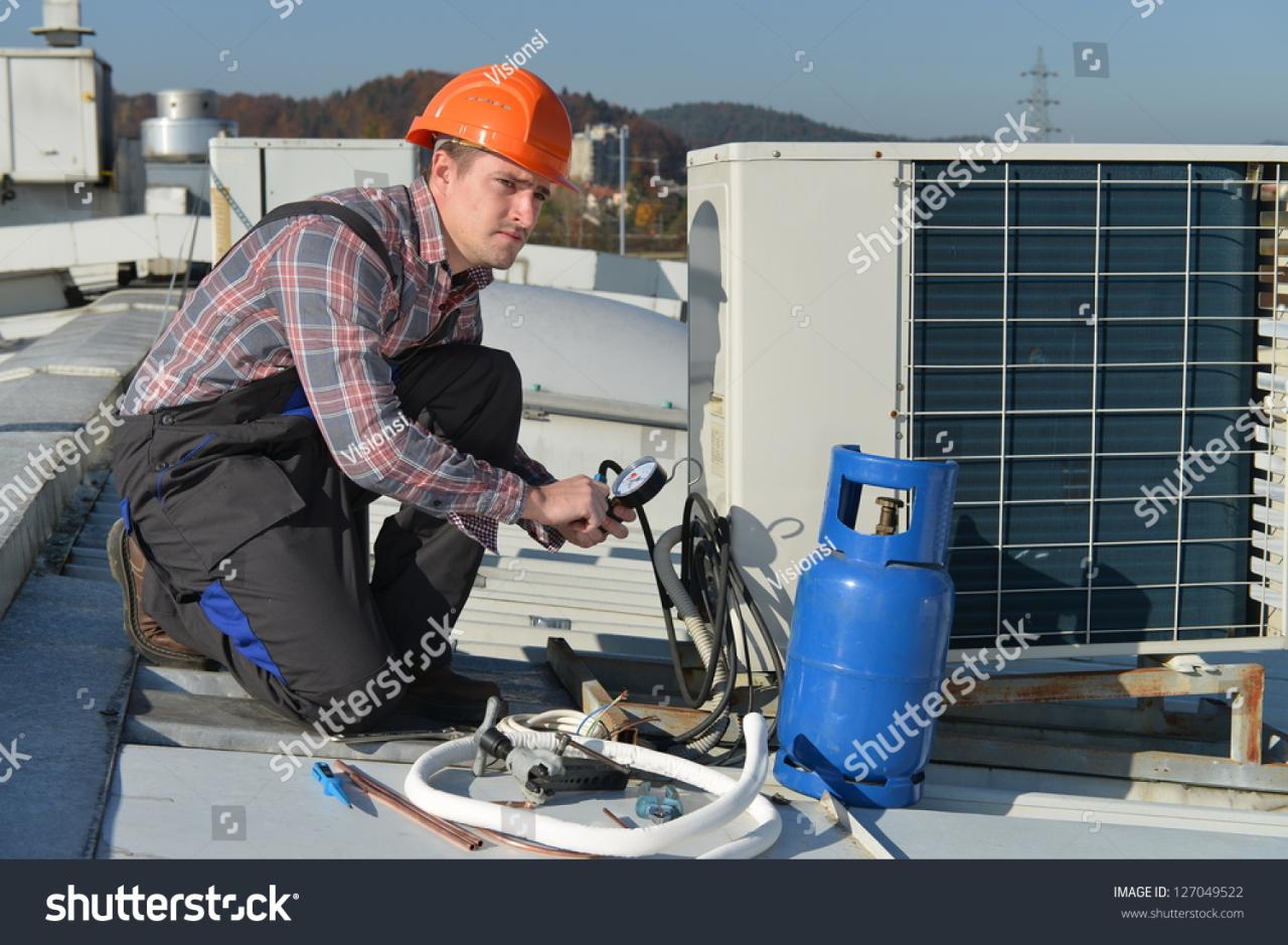 Air Conditioning Repair Young Repairman On Stock Photo 127049522 ... Air Conditioning Repair Young Repairman On Stock Photo 127049522 ...